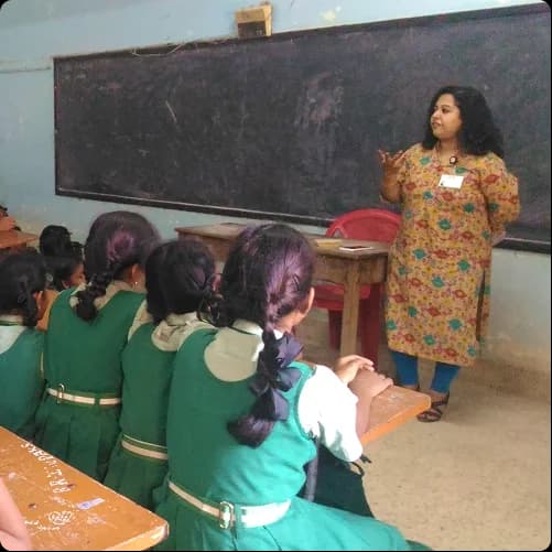 Facilitator leading a student outreach session